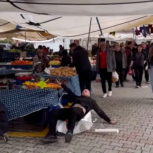 Bir içerik üreticisi Fethiye'de semt pazarını birbirine kattı: Tezgahların üzerinden takla attı